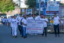 एनईसी कर्मचारी वॉकथॉन-सह-स्वच्छता रैली में भाग लेते हुए