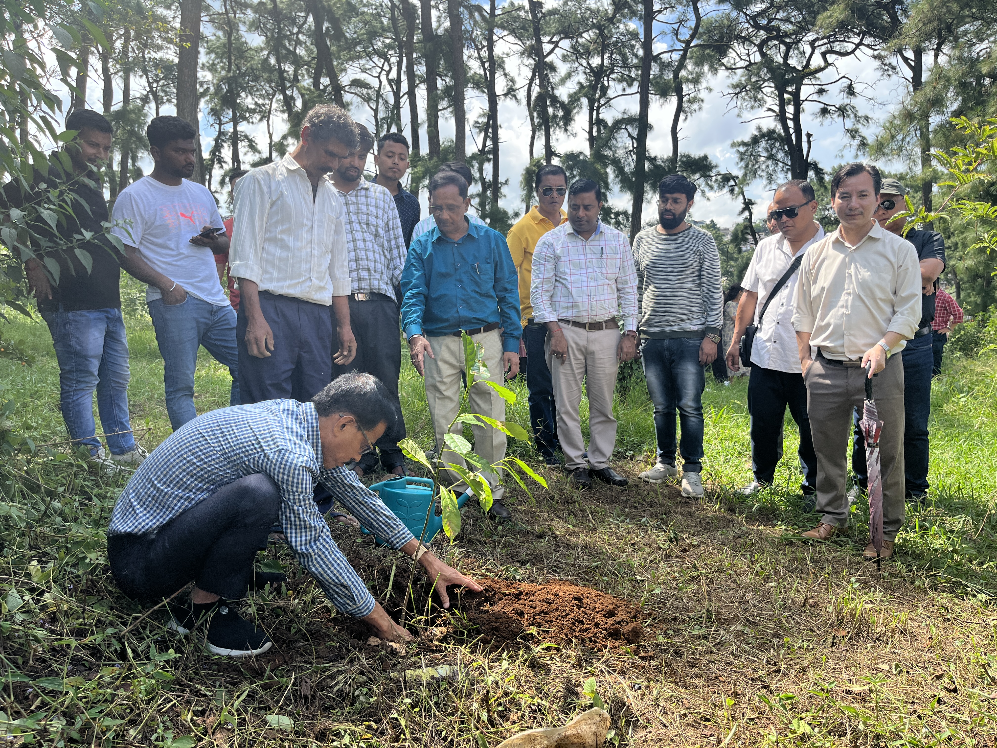 SE M. Kalita planting a tree during the 'Ek Ped Maa Ke
