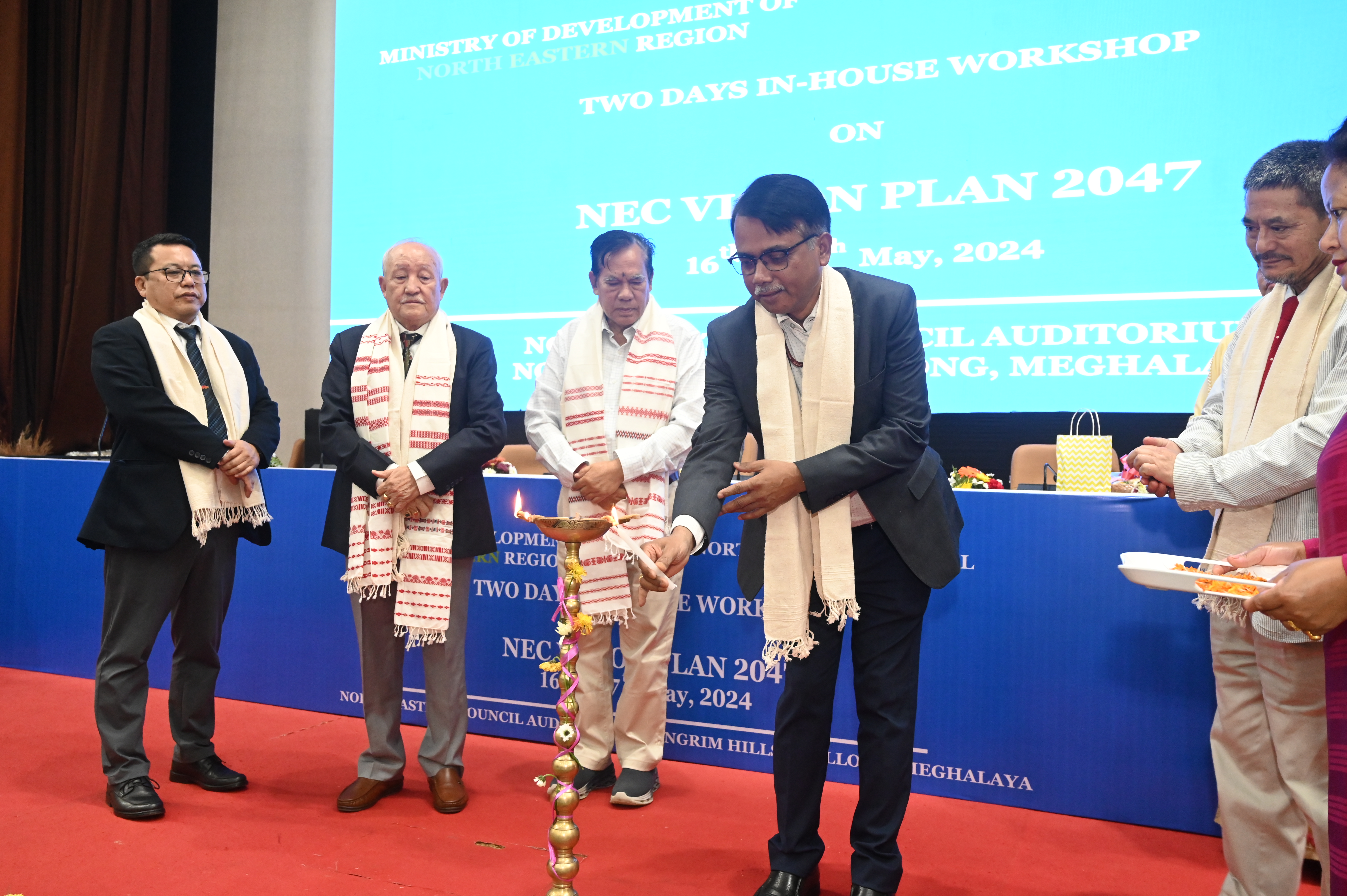 Secretary, NEC Sh. Angshuman Dey ligthing the lamp during NE