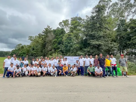 NEC officials posing for a group photograph after the Transformation of Difficult and Dirty Spots
