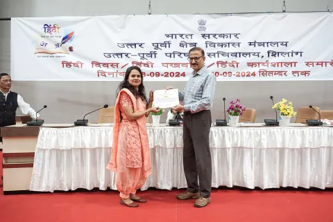 Director IPR and Official Language Officer Ajay Parashar honoring the winners
