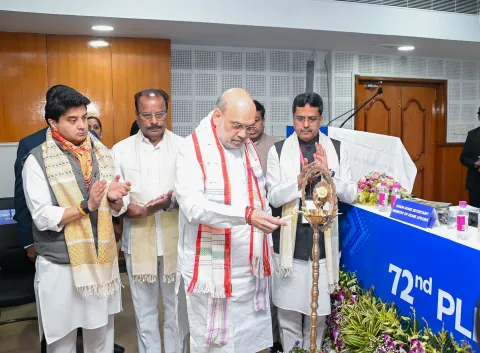 Home Minister and Chairman of the NEC, Mr. Amit Shah, lighting the lamp to mark the inauguration of the NEC Plenary