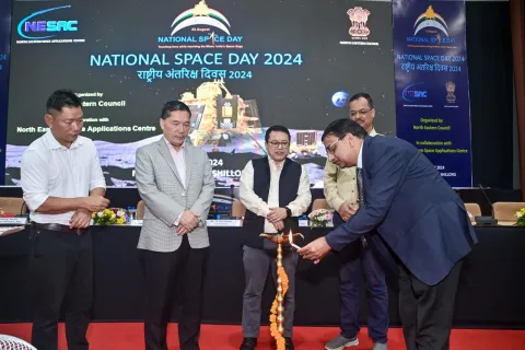 The ceremonial lamp is being lighting by Dr. S. P. Agarwal, Shri Som Kamei, Shri Thanglemliam, and Shri Tamung Jamoh