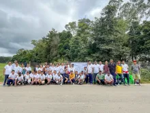 NEC officials posing for a group photograph after the Transf