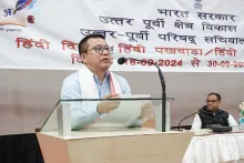 Planning Advisor Som Kamai addressing the closing ceremony o