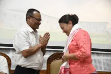 Ms. Sherry Lalthangzo, Economic Advisor, is being greeted du