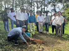 SE M. Kalita planting a tree during the 'Ek Ped Maa Ke