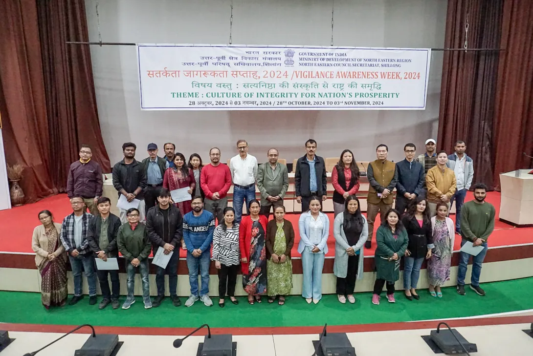 Winners and participants of various events posing for a phot