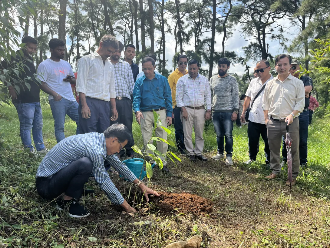 SE M. Kalita planting a tree during the 'Ek Ped Maa Ke