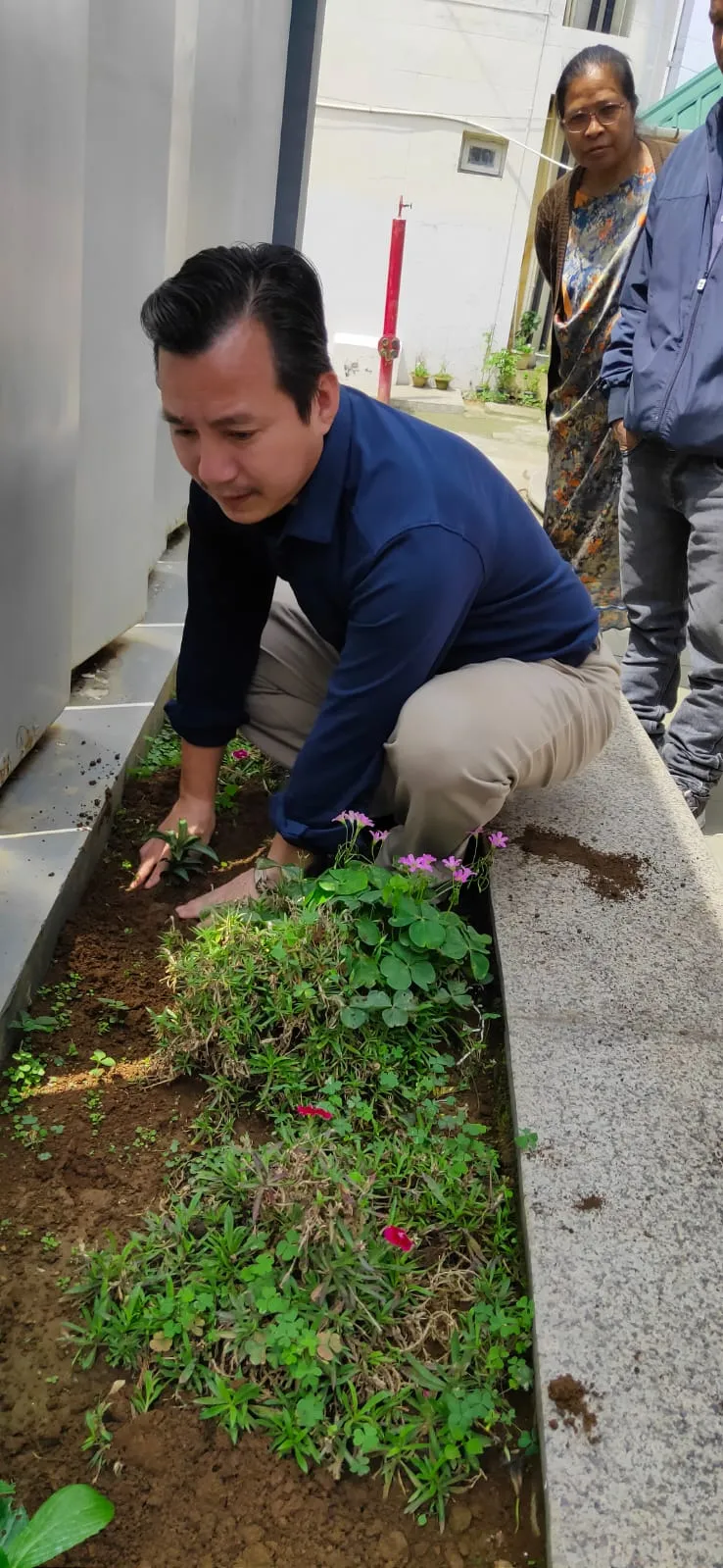 Assistant Secretary Sh. Bamin Tarang planting a sappling of